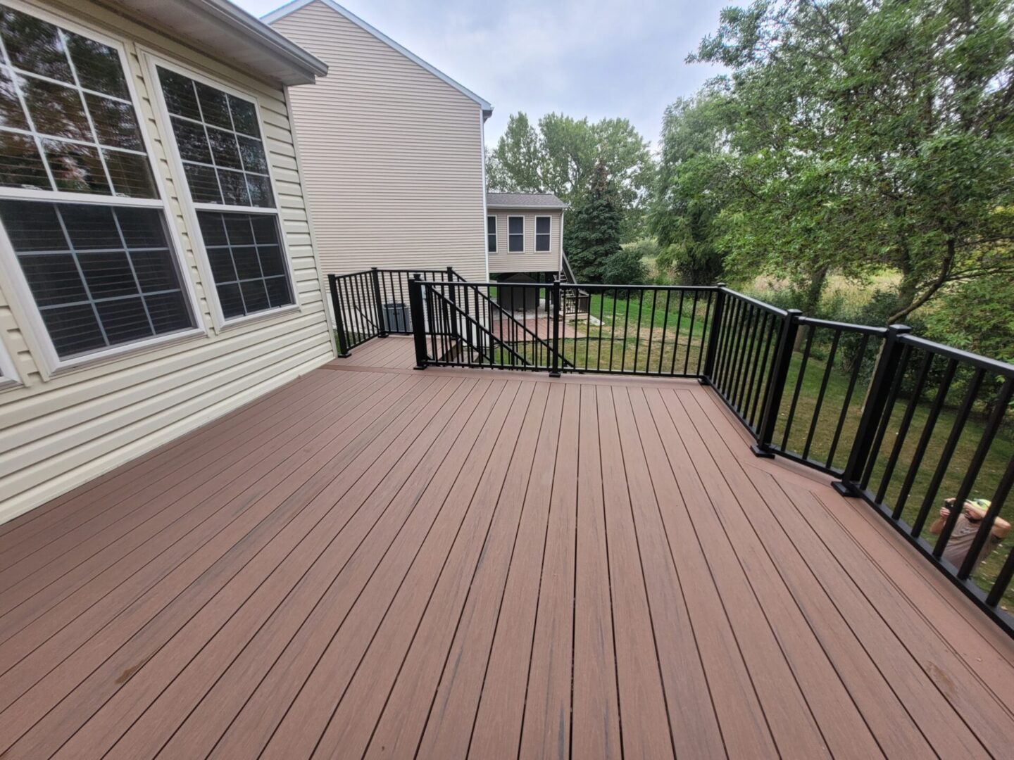 dark deck black railing long view scaled