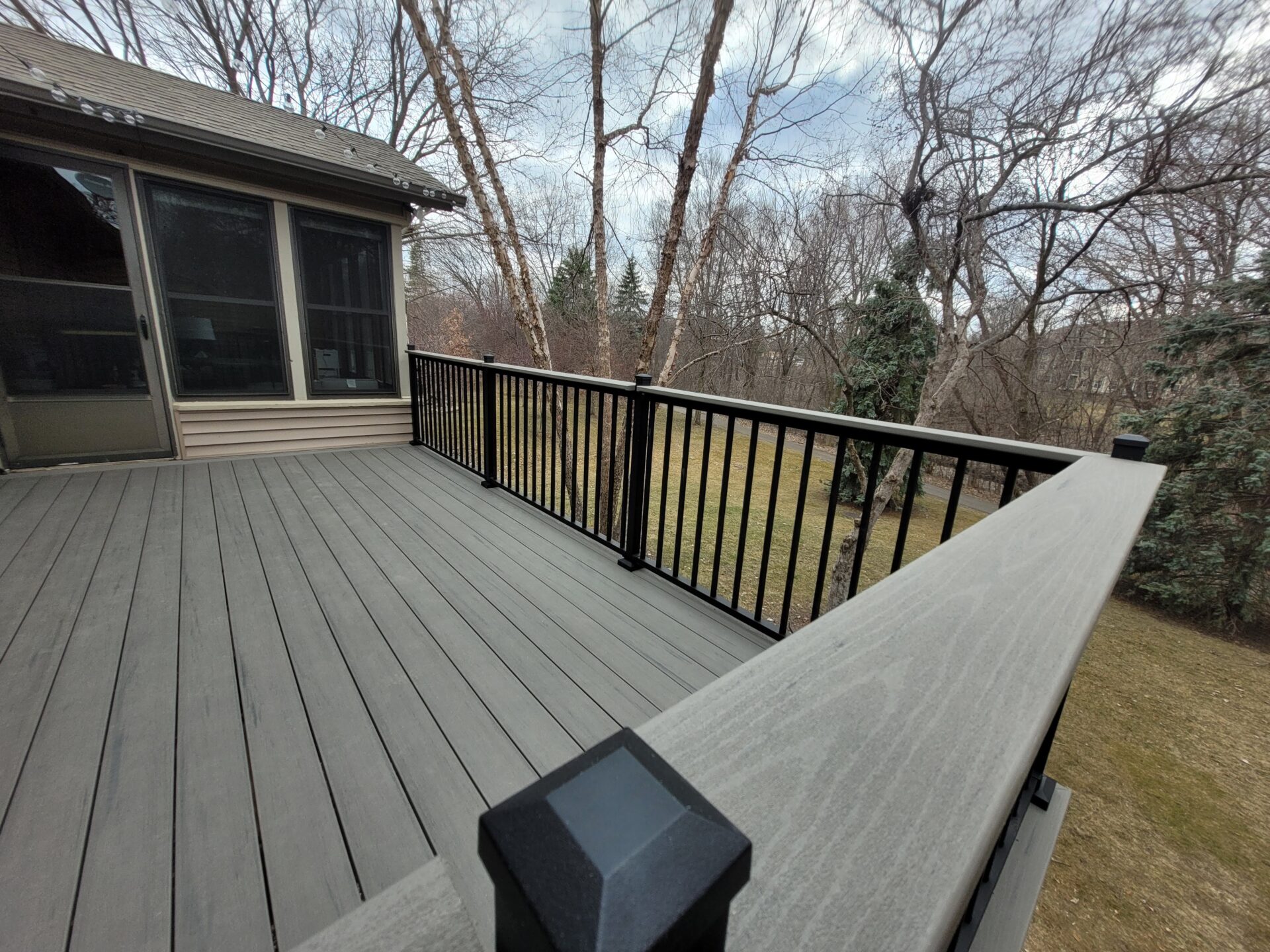 deck with black railing ledge scaled