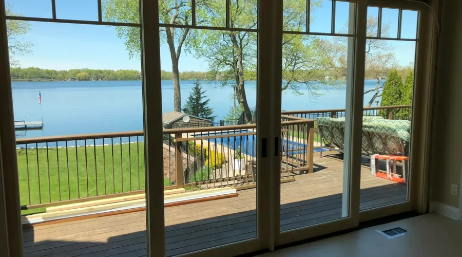 A large open window overlooking the water.