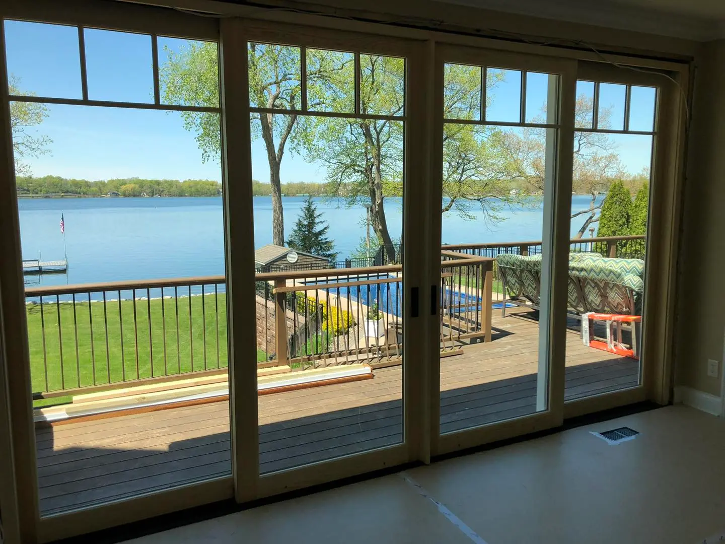 A large open window overlooking the water.