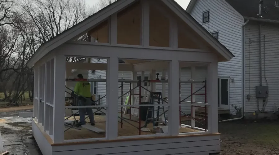 A person working on the inside of a house